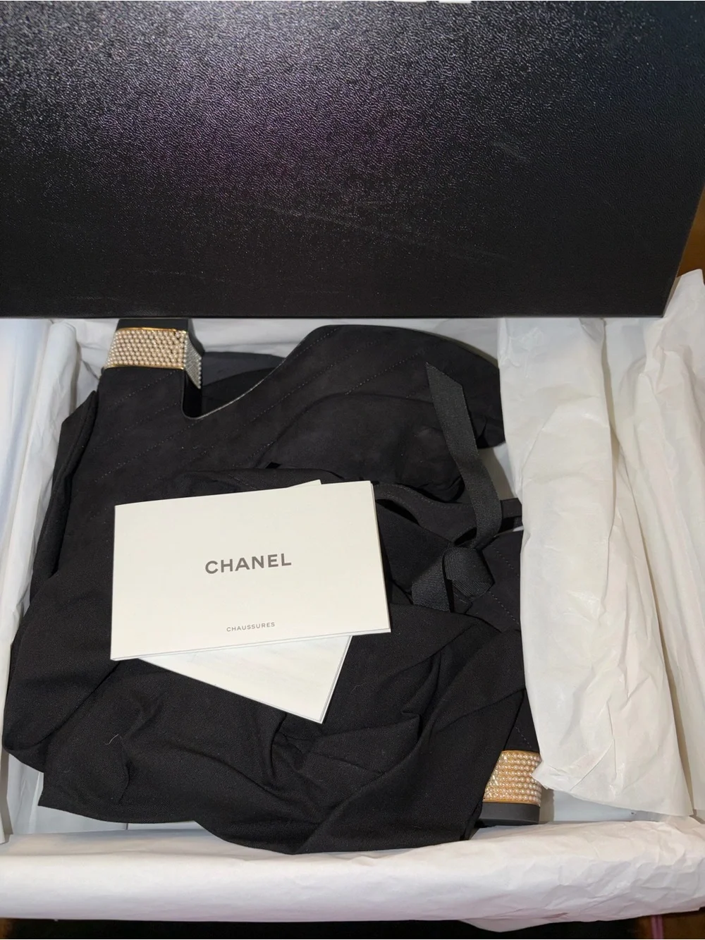 CHANEL Black Suede Platform Sandals with Bow and Pearl Heel Accent